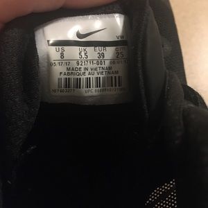 Women’s size 8 Nike basketball shoes.